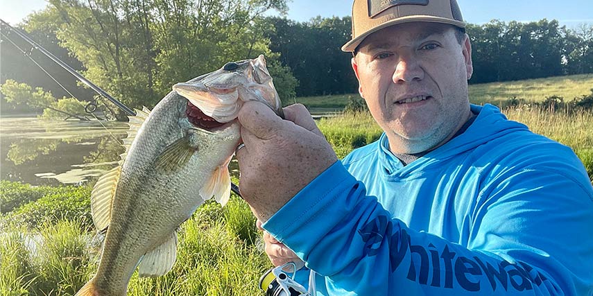 Heath Wood Summer Pond Fishing for Largemouth Bass wearing Whitewater tech hoodie catch Bass